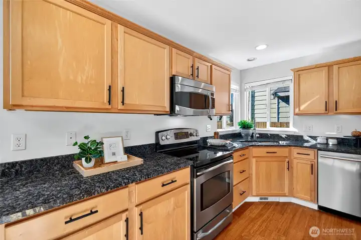 Enjoy granite countertops and stainless steel appliances