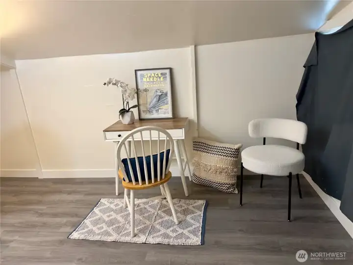 Extra space in Laundry area for home office.