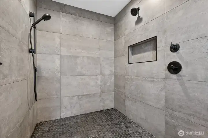 Walk-in shower with waterfall rain head