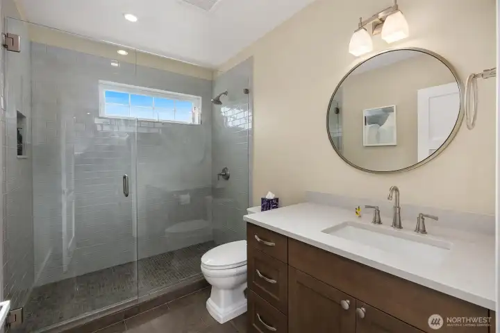 Main floor bathroom, adjacent to bedroom.
