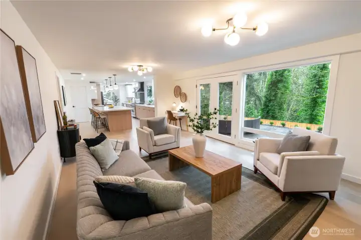 Roomy family room leads to private back yard.