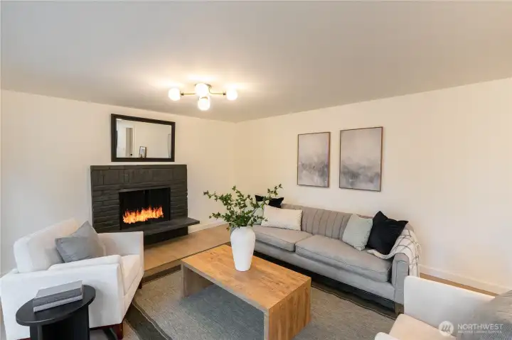 Cozy wood fireplace in family room.