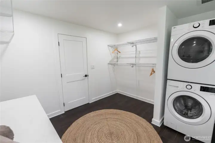 Enjoy Primary Suite's walk-in closet with separate laundry.