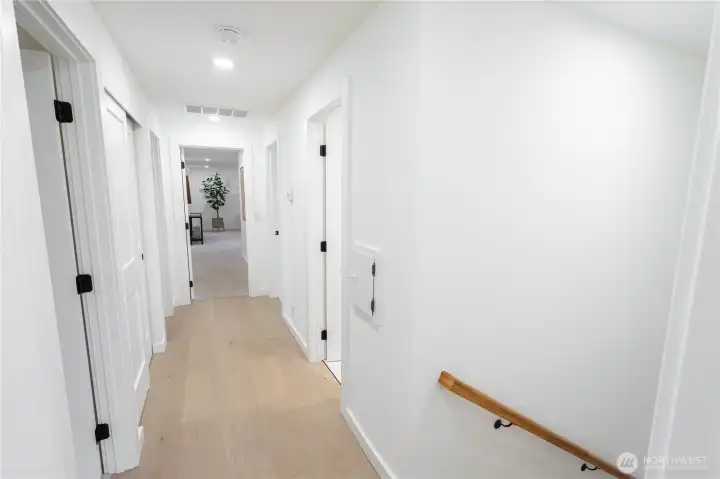 This roomy home has 4 more bedrooms upstairs.