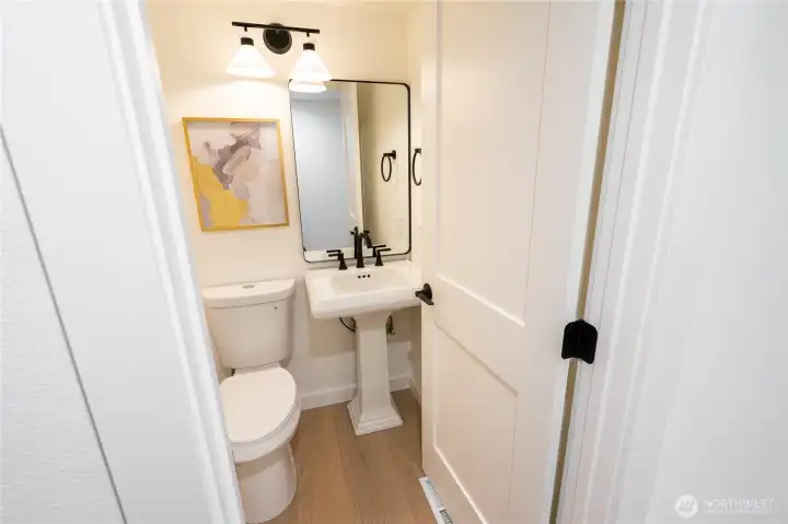 Powder room on main floor for guests.