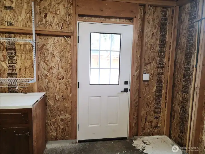 This door leads out to the back yard.