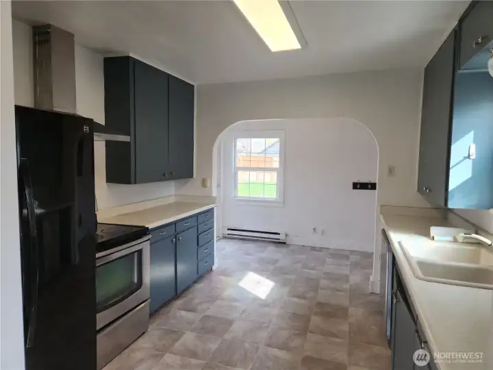 View of the kitchen, you can see the area for a small dining area.