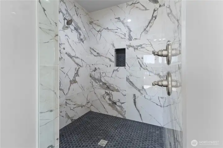 Primary Suite Double headed shower with bench