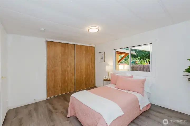 Primary bedroom featuring a large closet and ample wall space for furniture placement.