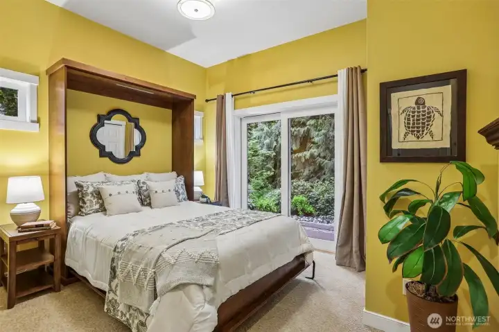 Main Level Guest Suite with backyard patio access,