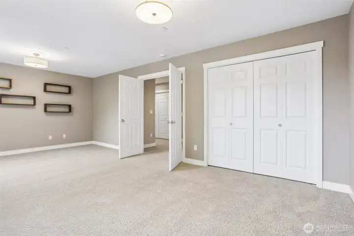 Without Virtual Staging. Closet has removable sewing table and built in storage