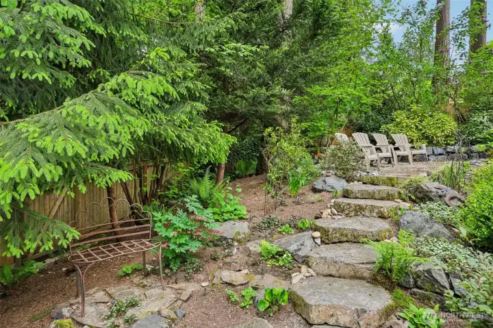 Walkway to peaceful, park-like landscaped retreat area