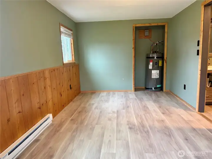 Wainscotting in bedroom with new water heater