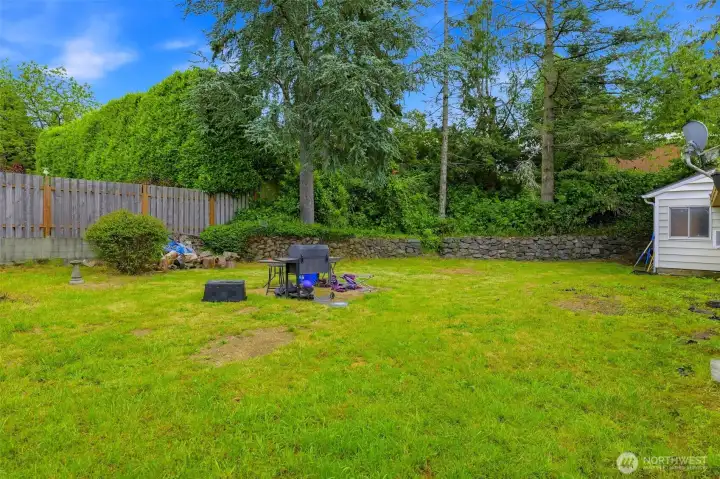 Mostly level backyard with some terraces. Mostly level backyard with some terraces.