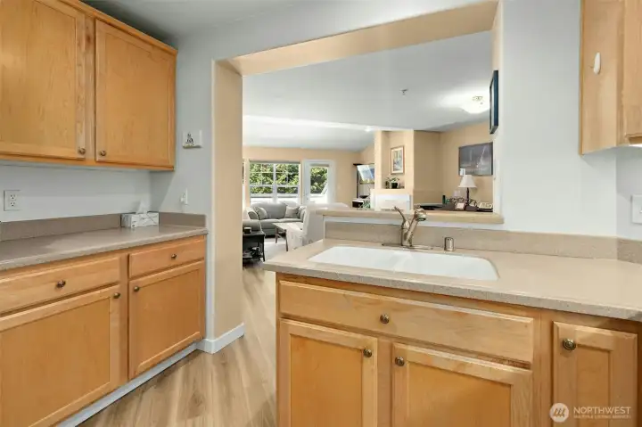 View from kitchen looking into your open concept living and dining spaces.