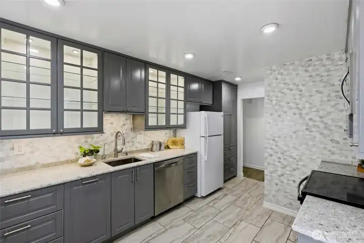 Beautifully updated kitchen with under cabinet lighting