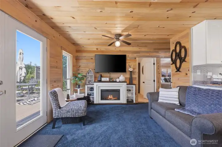 French doors to deck on the left- Bedroom door showing- and that room has a window facing the lake.