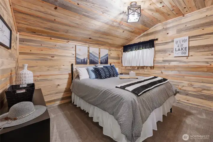 DEN- used as the second bedroom. Love the knotty pine paneling!