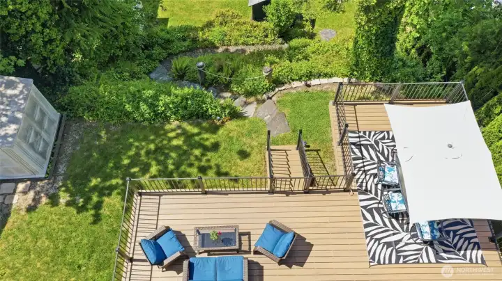 An overhead close up of the deck and landscaping- stairs down to the DOCK.