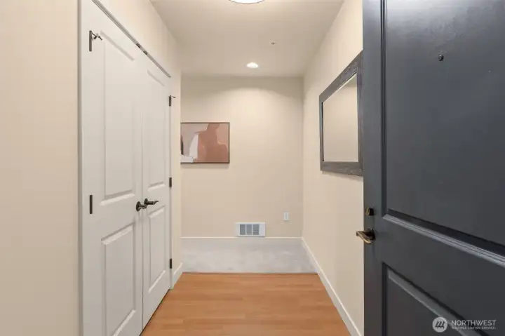 Private entry, long hallway and coat closet upon entry