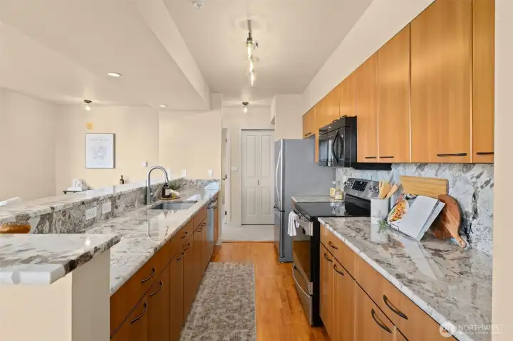 Kitchen equipped with plenty of counter space and storage
