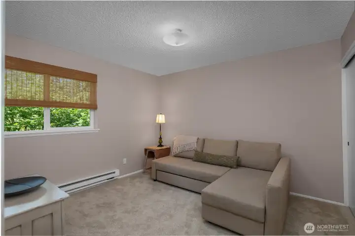 Great sized guest bedroom with private view of greenery - perks of owning an end unit.