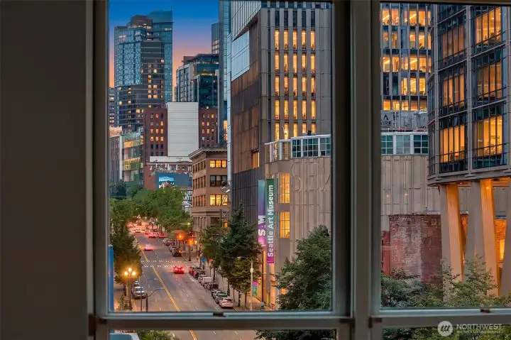 View from #701: Downtown Seattle at eye level, looking north along First Avenue toward Pike Place Market.