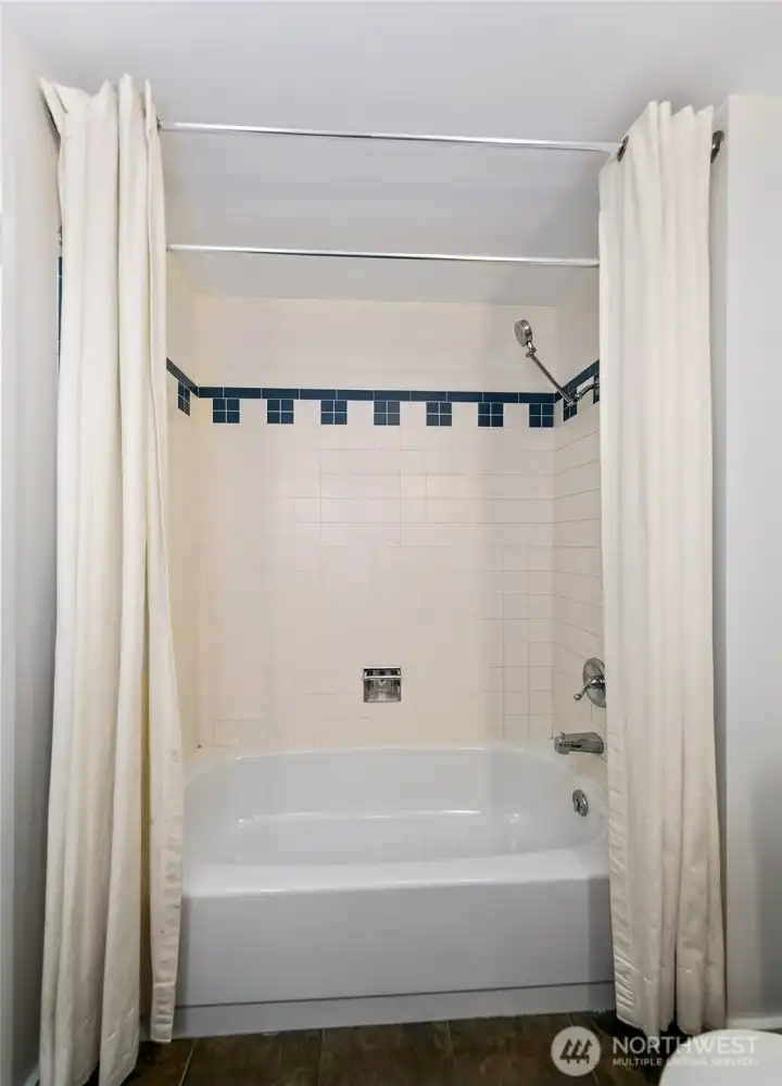 A full bath completes the one-bedroom plan.