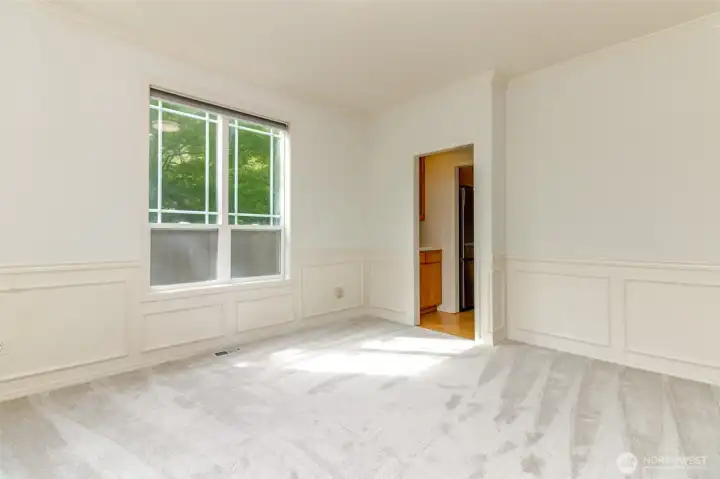Formal dining room with butler's pantry in the background Formal dining room with butler's pantry in the background