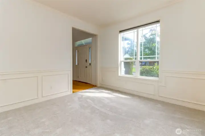 Formal dining room with crown molding and wainscoting Formal dining room with crown molding and wainscoting
