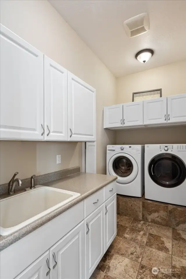 Laundry with utility sink and great storage