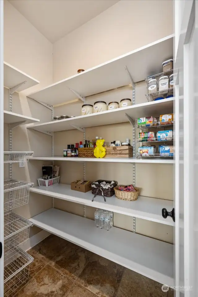 Kitchen custom features include walk-in pantry