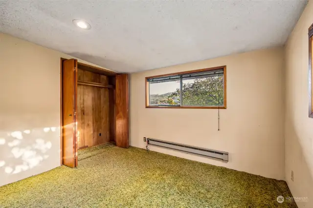 Bedroom 1, Primary, located on water side of the cabin.