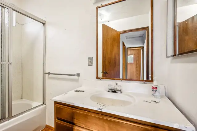 Bathroom with tub/shower.