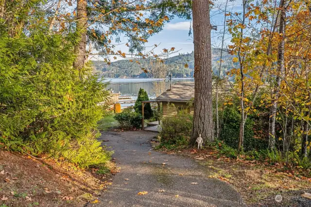 Driveway loop down to cabin; paved.  Access property via shared driveway.