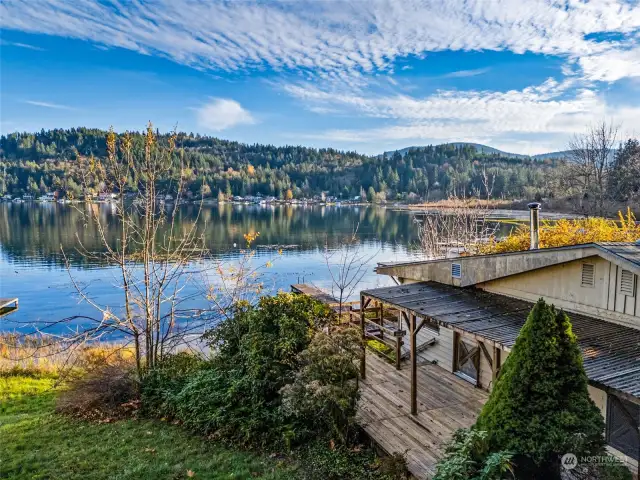 View from driveway looking down on cabin and waterfront.