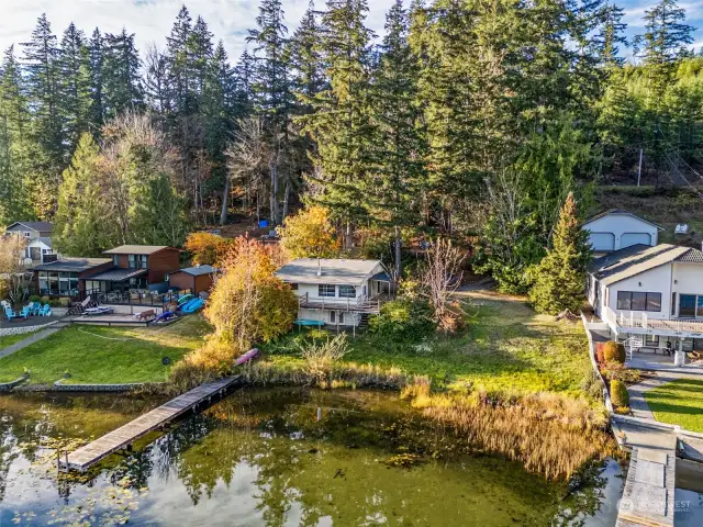 Great cabin, incredible location, natural riparian shoreline, dock and two waterfront parcels.