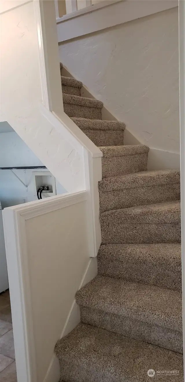 Stairs to access 2nd floor of main house and primary bedroom