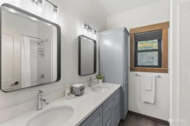 Double sinks in main bathroom.