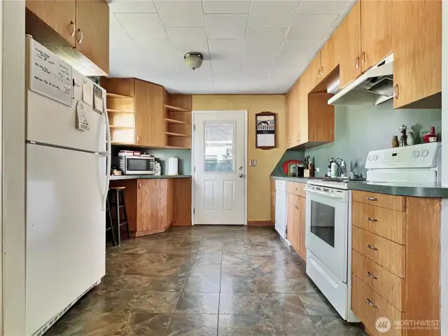 Kitchen open to dining and living area