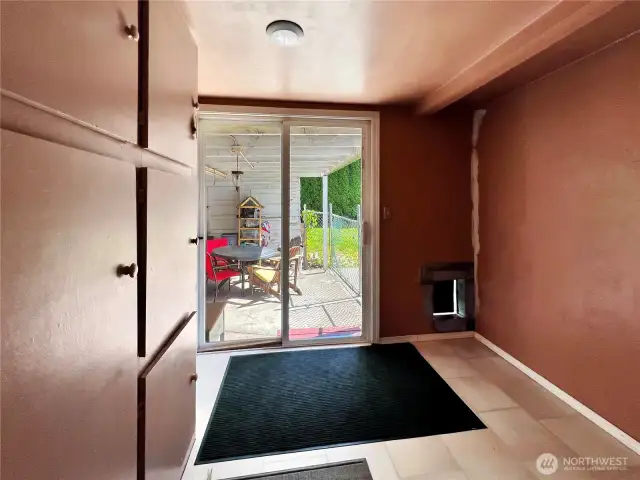 mud room with dog door