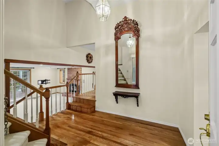 Beautiful grand entry. Mirror and matching shelf stay with home.