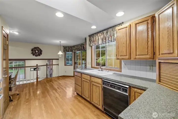 Kitchen w/premium finishes & generous cabinetry.