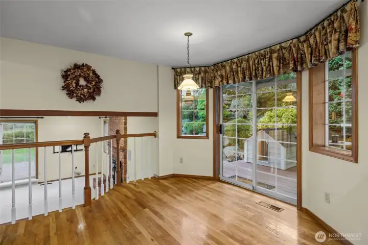 Eat in kitchen table space and back yard deck access.