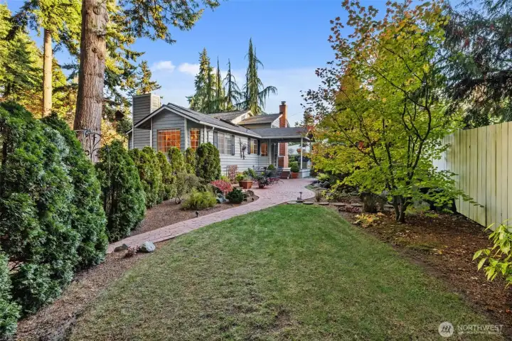Sidewalk from courtyard and koi pond to front of home.