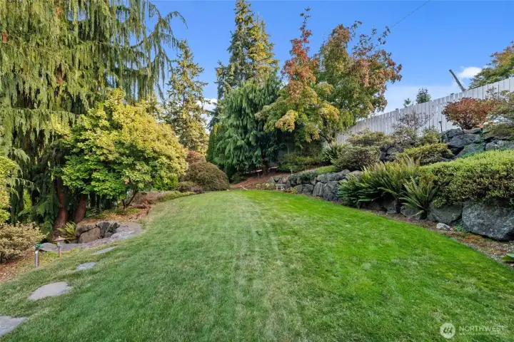 Expansive back+side yards ideal for gatherings, gardening or quiet reflection