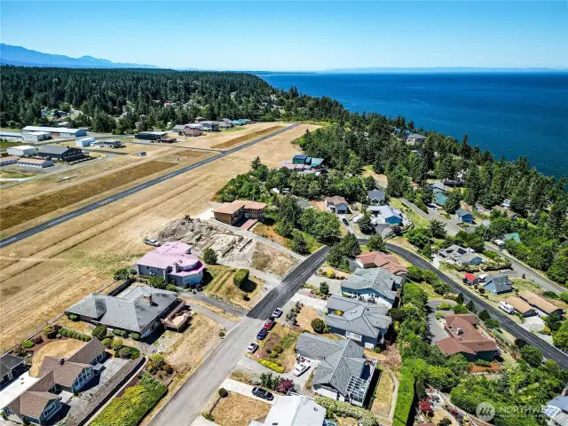 2nd house from left backs to airport