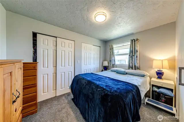 Upper level apartment bedroom