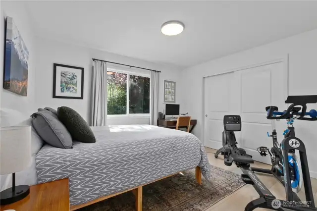 Guest bedroom easily accommodates a queen bed