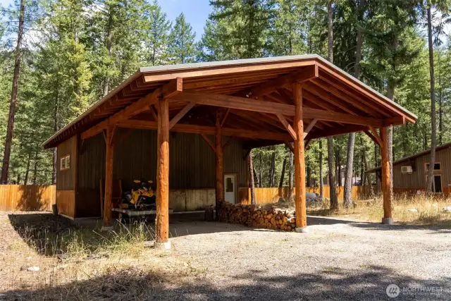 Huge carport with attached climbing gym/weight room